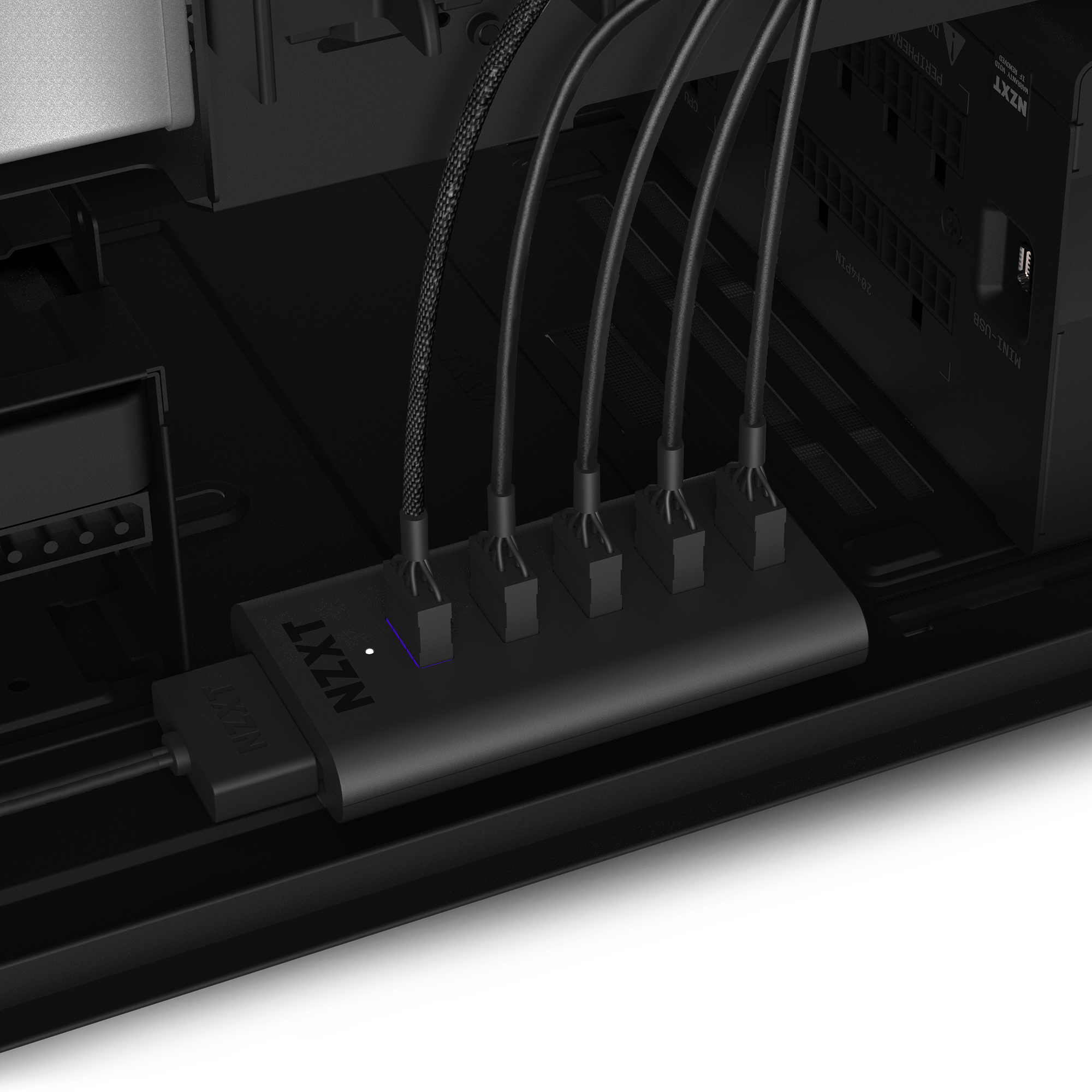 A close-up shows the NZXT Internal USB Hub inside a PC case, powered via SATA, with five cables attached and a small blue LED indicator glowing.