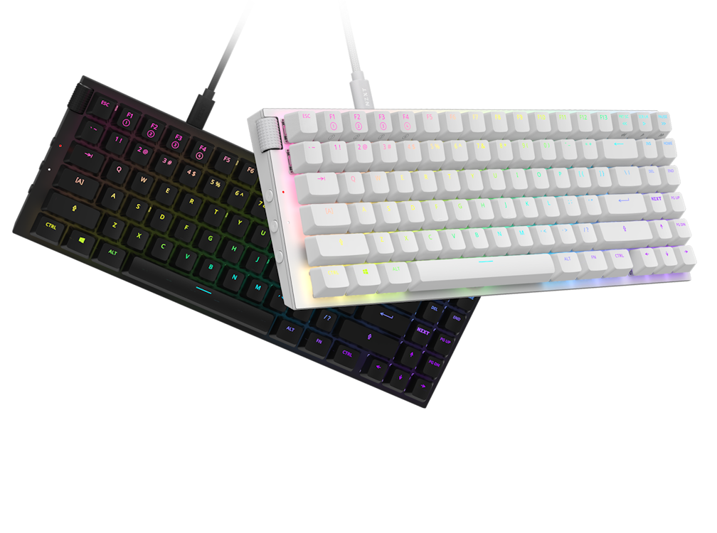 Two compact mechanical keyboards, one black with RGB backlighting and one white with pastel RGB backlighting, are placed diagonally and overlapping, both connected with detachable cables.