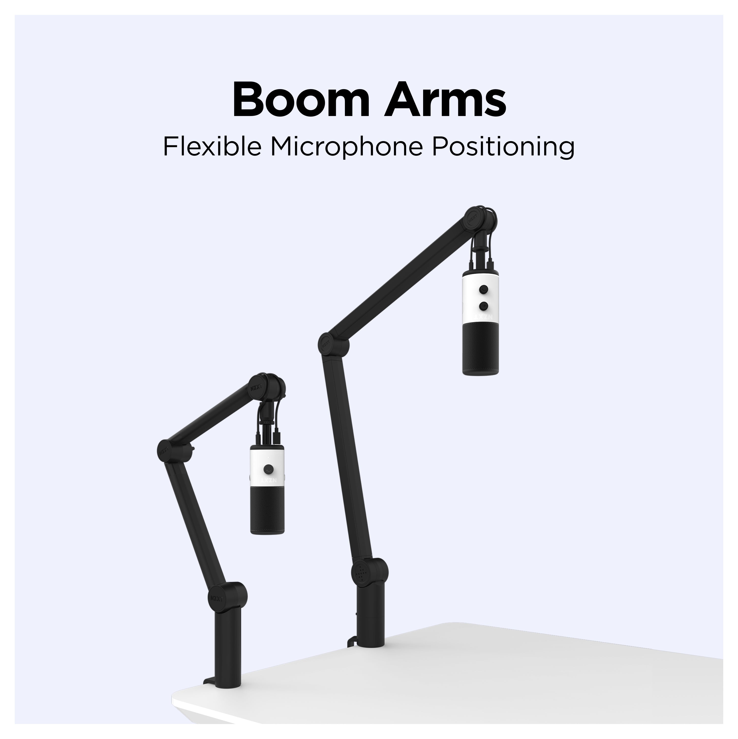 Two boom arms with attached microphones are mounted on a white desk, demonstrating flexible positioning. Text above reads Boom Arms Flexible Microphone Positioning on a light background.